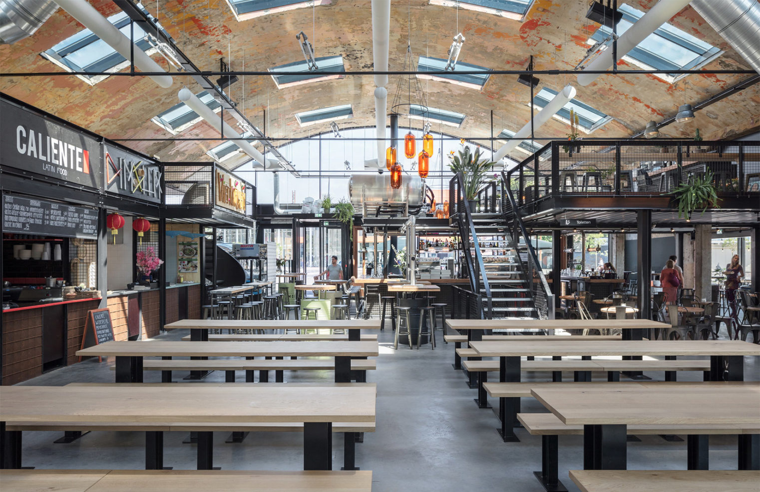 former-garage-is-reborn-as-mout-foodhall-in-holland-s-hilversum