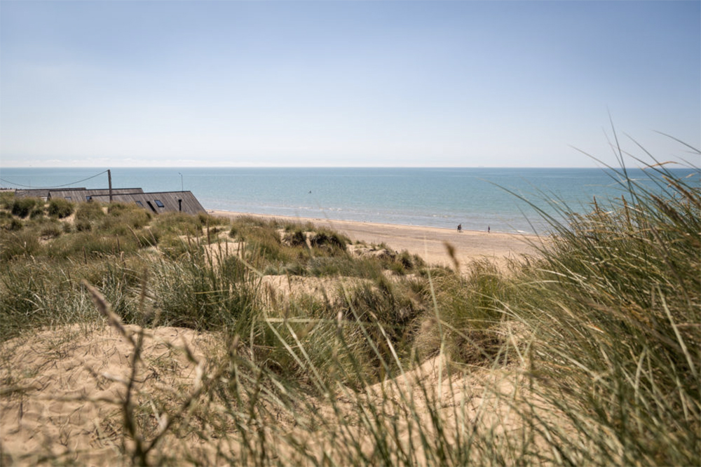 Camber beach house plot via The Modern House