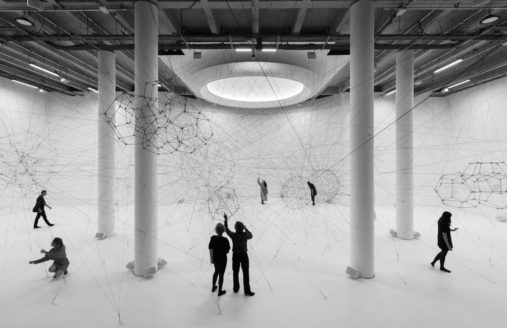 Tomás Saraceno spins a ‘cosmic’ spiderweb inside Paris’ Palais de Tokyo