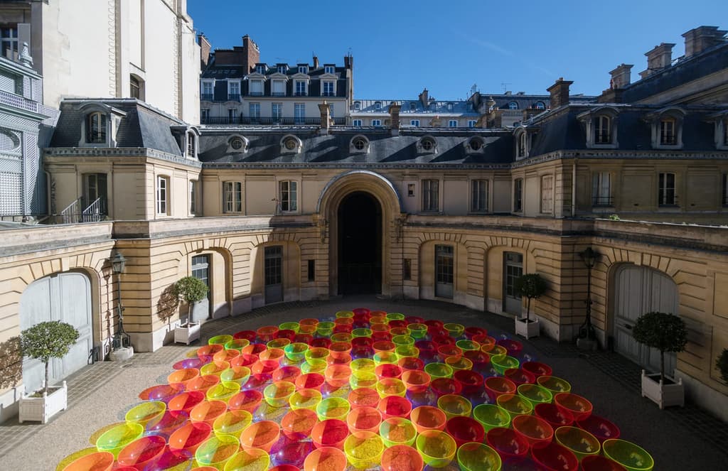 Artist Liz West sets a Parisian courtyard aglow