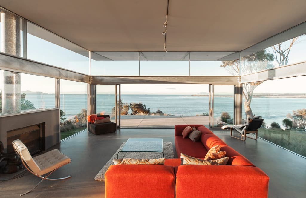 Holiday home of the week: a glass house that beds into the Tasmanian coastline