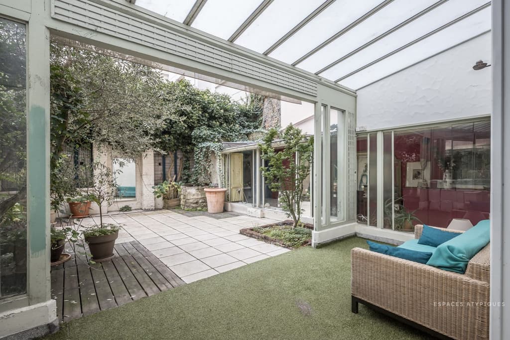 Antique-filled atelier for sale in Paris
