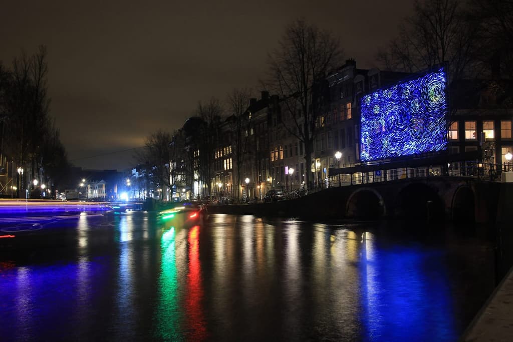 Van Gogh’s Starry Night illuminates an Amsterdam bridge
