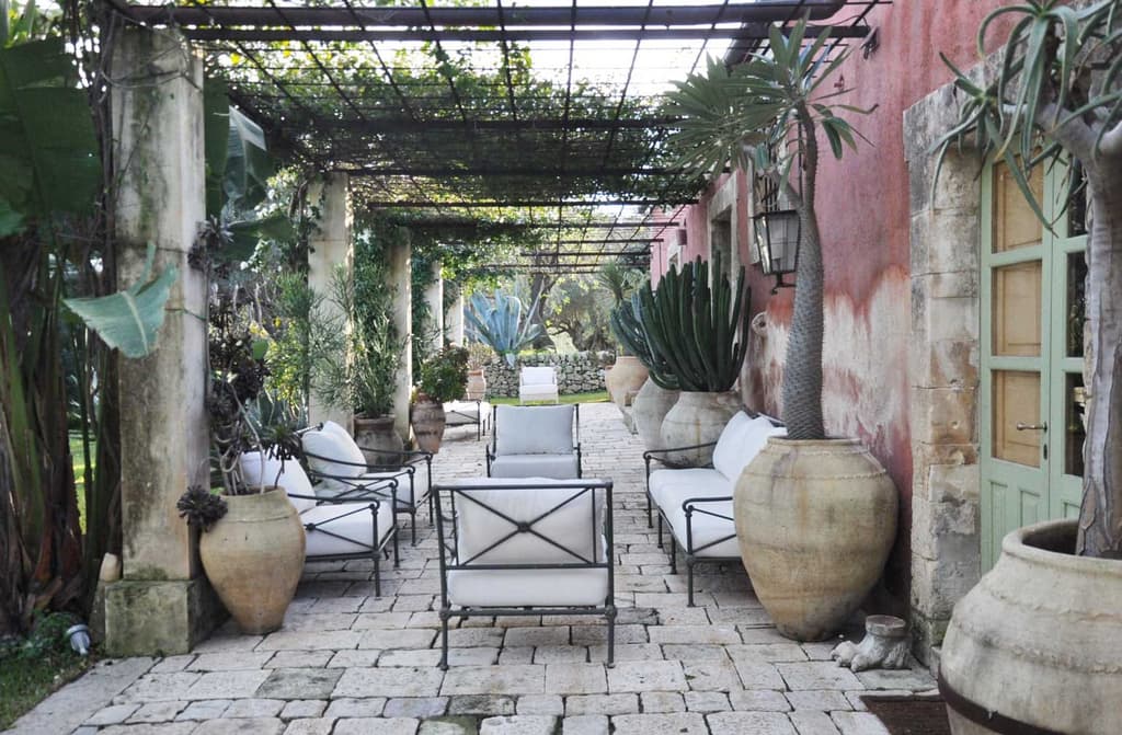 This sun-baked retreat by Jacques Garcia is surrounded by ancient olive groves
