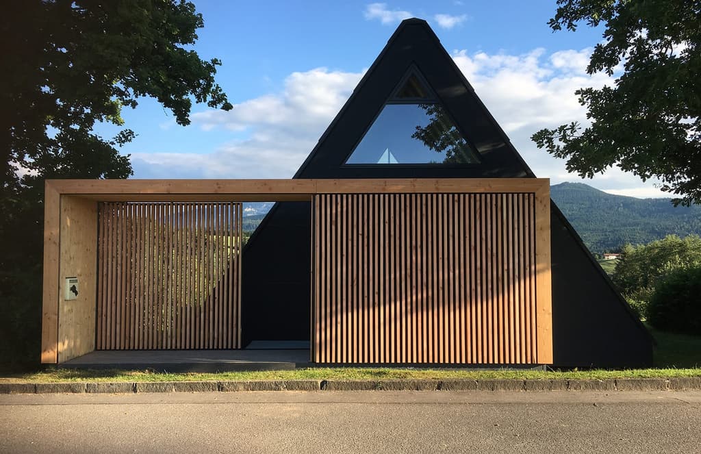 A 1970s A-frame is given a minimalist makeover near Salzburg