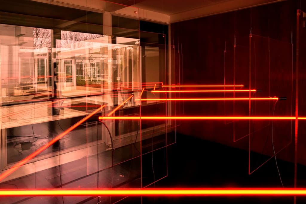 Art duo Luftwerk has installed a floating grid of colour inside Mies van der Rohe’s McCormick House in Chicago.