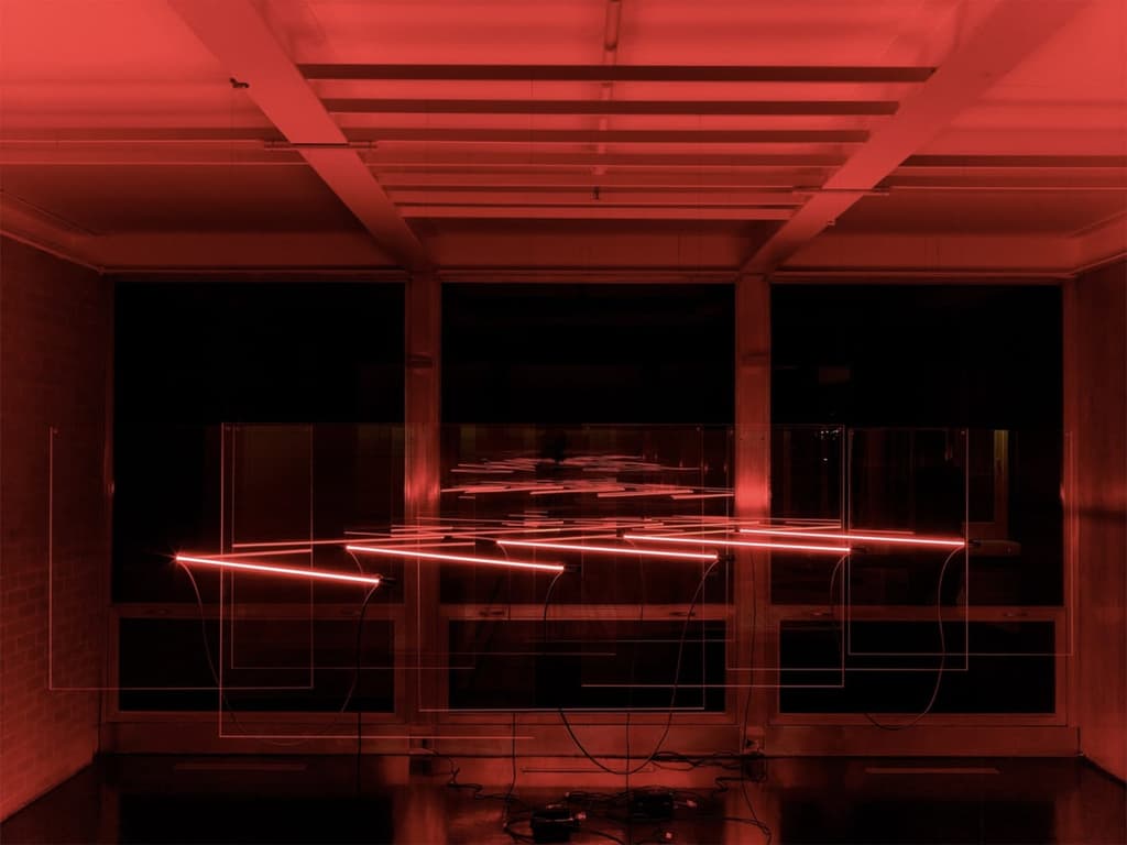 Art duo Luftwerk has installed a floating grid of colour inside Mies van der Rohe’s McCormick House in Chicago.