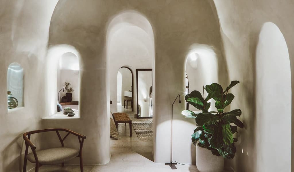 Villa Vora is an angular retreat carved into a volcanic clifftop in Santorini