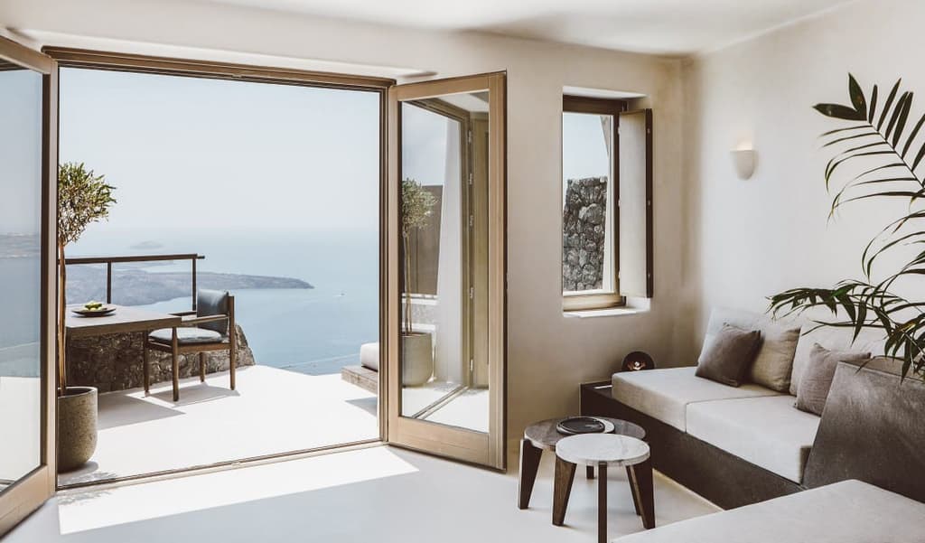 Villa Vora is an angular retreat carved into a volcanic clifftop in Santorini