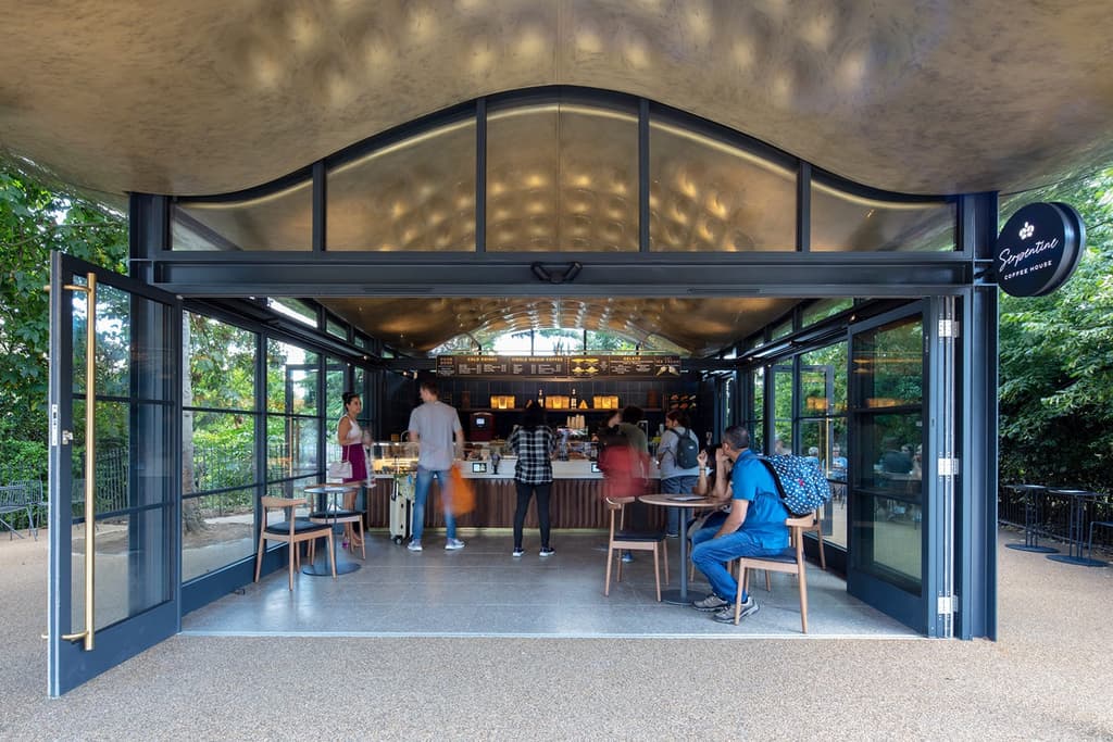 A new ‘floating’ pavilion has opened in Hyde Park in the form of a skeletal cafe by Mizzi Studio.