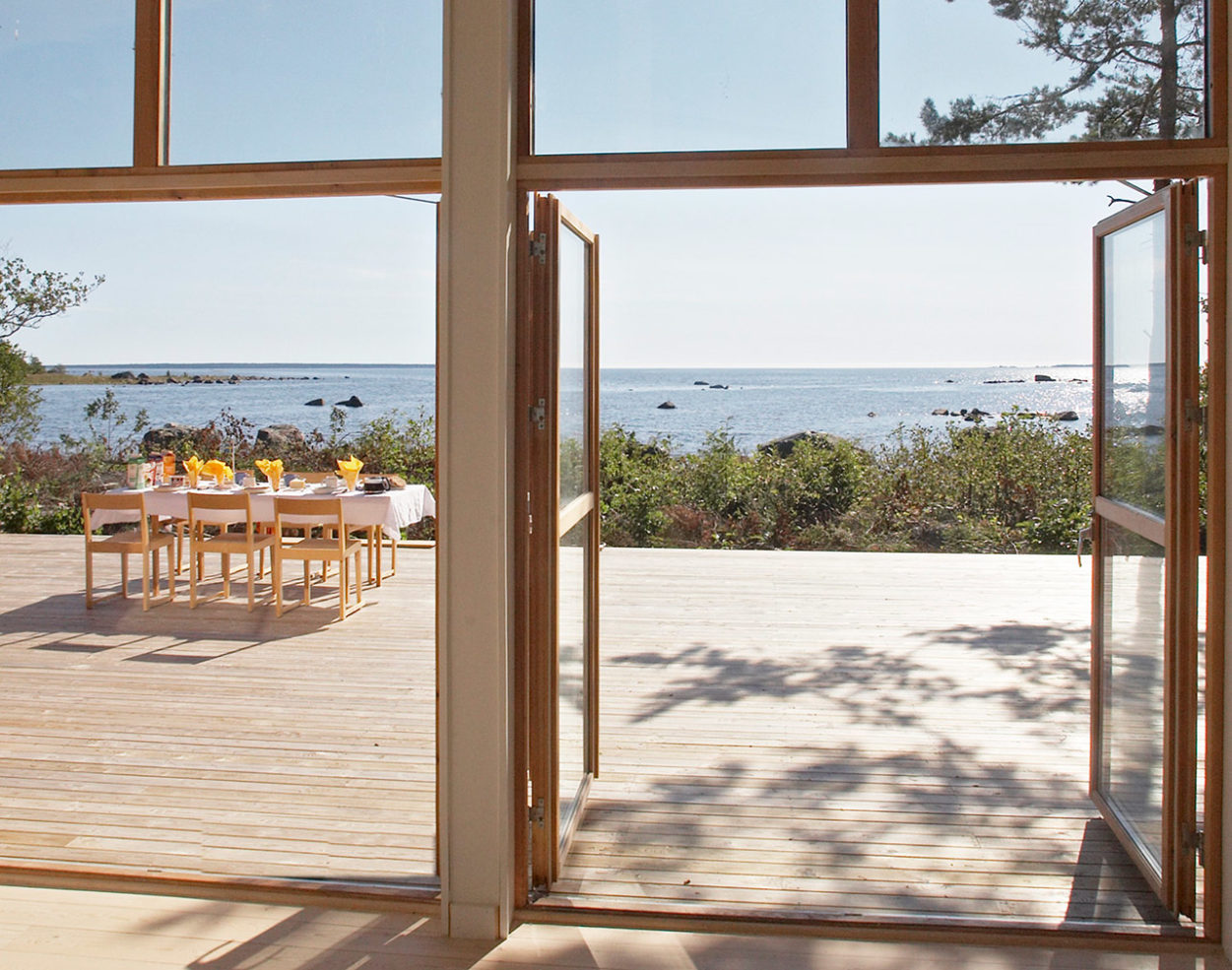 A private Swedish island with striking red cabin home could be yours