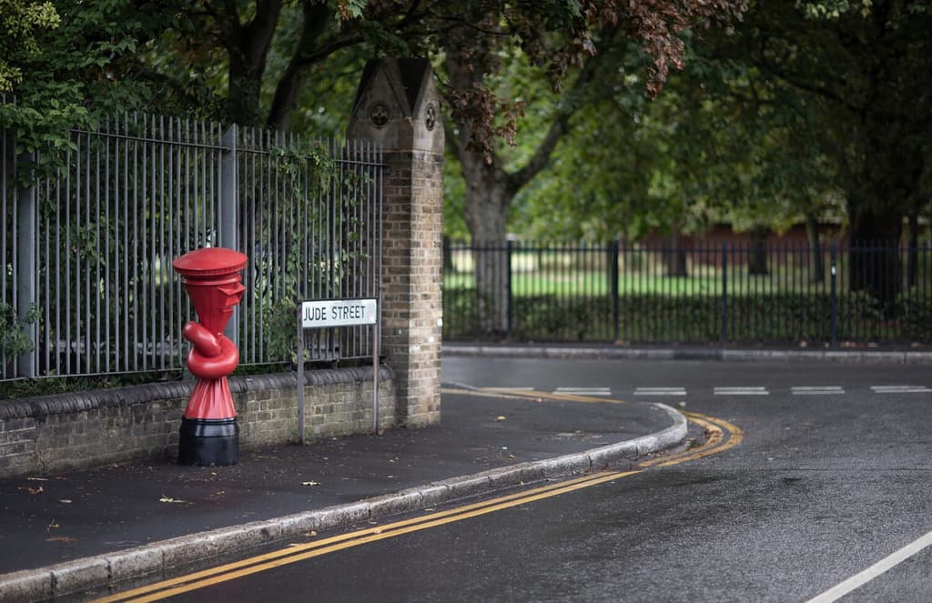 Alex Chinneck gives the UK’s iconic red post box a twist