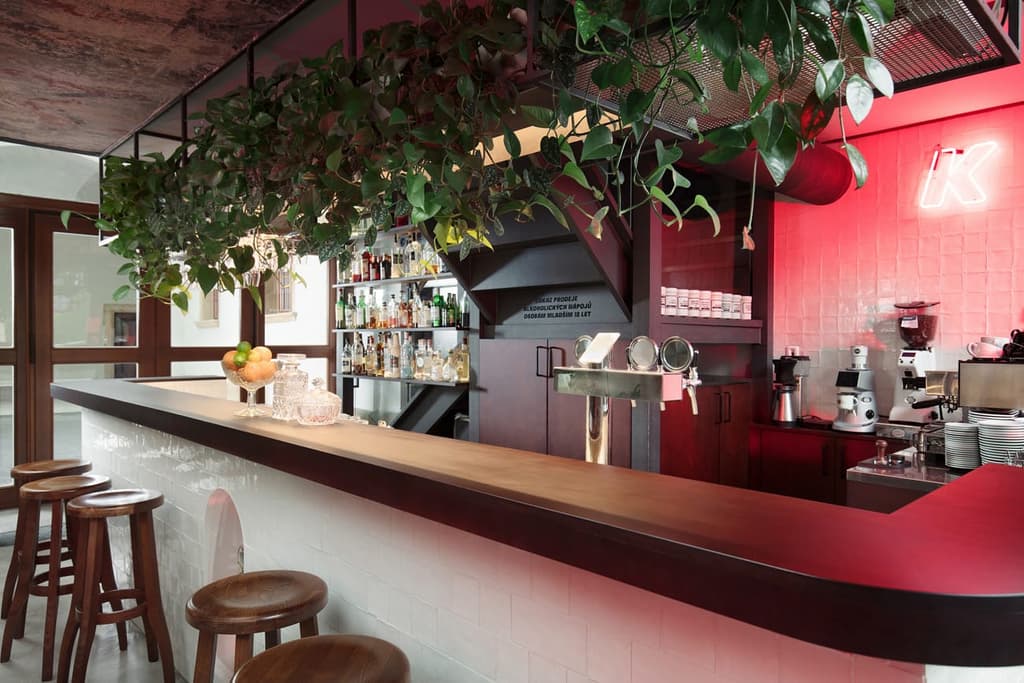 Konvikt coffee shop blurs neon kitsch with baroque design