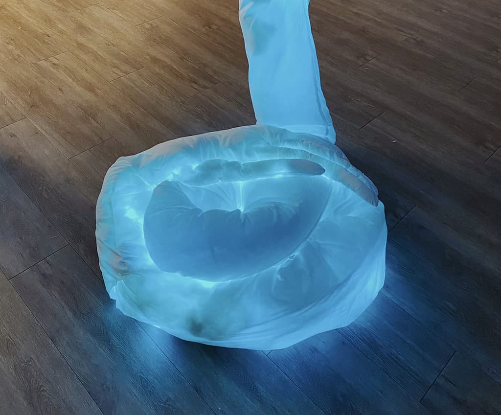 Glowing limbs reach through The Delisle Space in Toronto for DesignTO