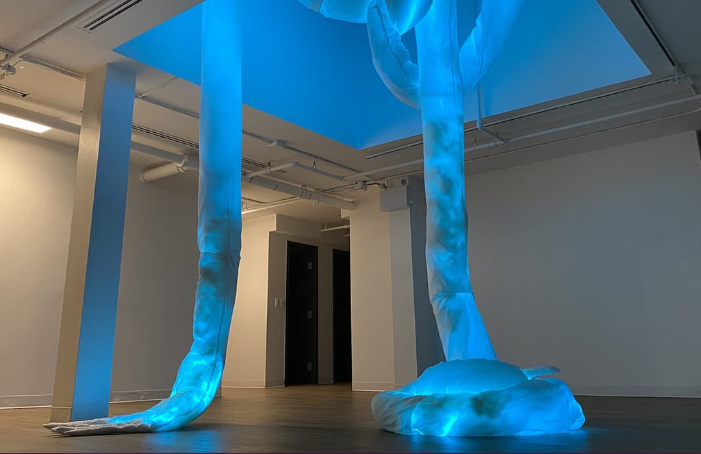 Glowing limbs reach through The Delisle Space in Toronto for DesignTO