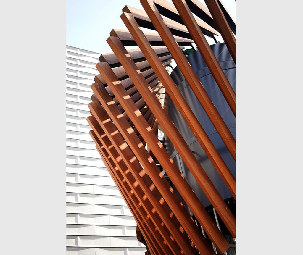 Kinetic architecture arrives in Hong Kong with the Harbour Kiosk. It's operated by 49 robotic arms