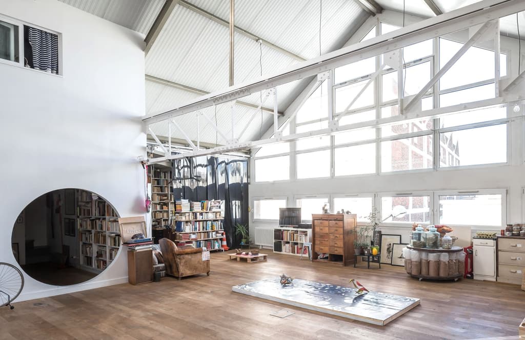 Industrial volumes pack a punch inside this Parisian live/work loft