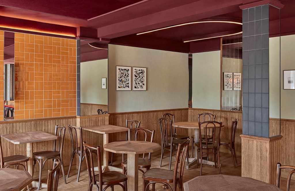 Burgundy tones and tiles set the scene at Amsterdam bistro Bonnie