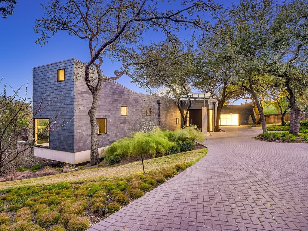 A writer's brutalist Austin estate blends barn and loft living