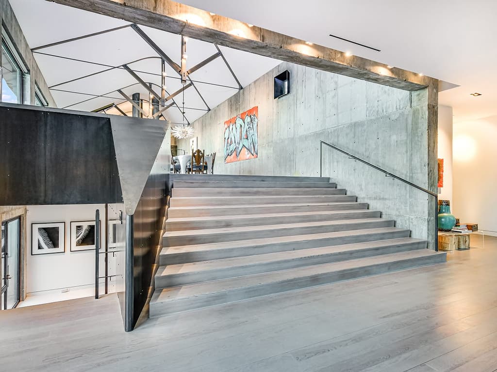 A writer's brutalist Austin estate blends barn and loft living