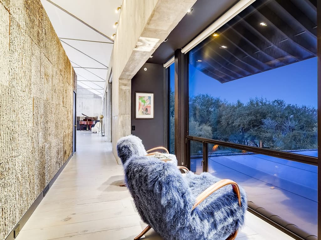 A writer's brutalist Austin estate blends barn and loft living