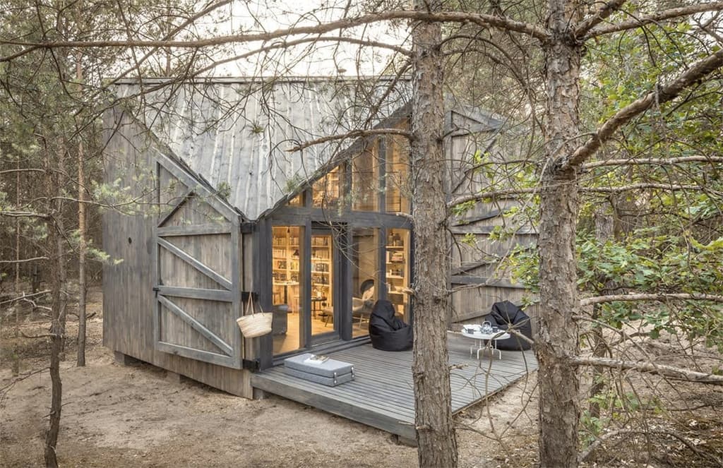 Bookworm Cabin is a miniature library in the woods outside Warsaw