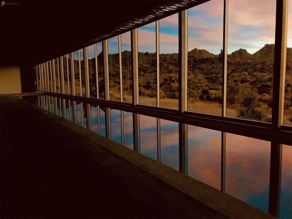 Invisible House reflects the Californian desert from its mirror-clad walls