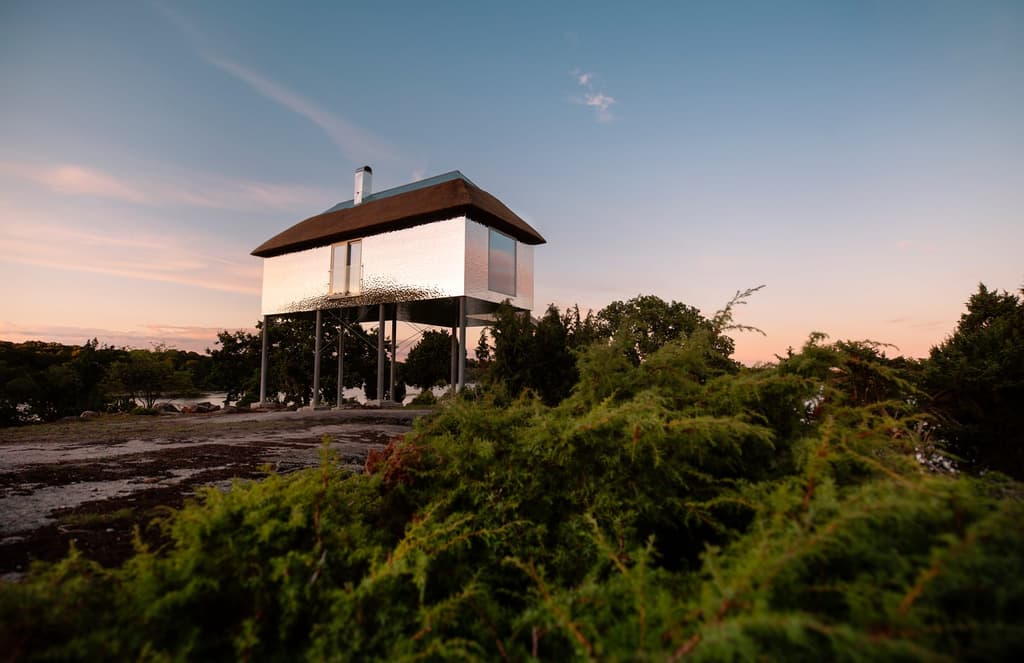 This mirrored villa lies in a 2,200-acre safari park in Sweden