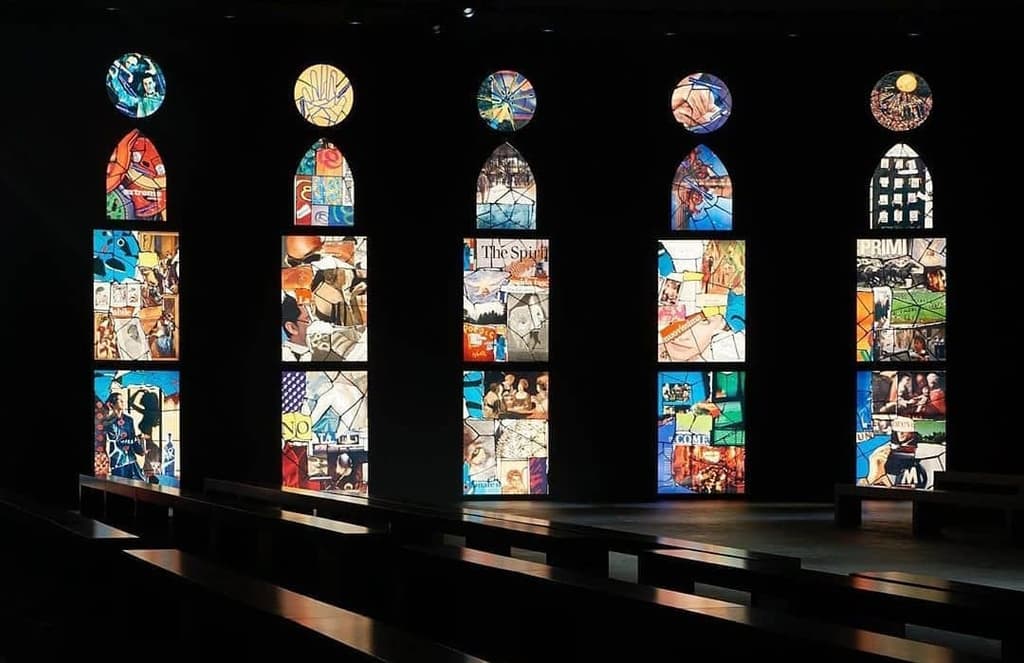 Towering stained-glass windows cast an ethereal glow across Dior’s SS21 show
