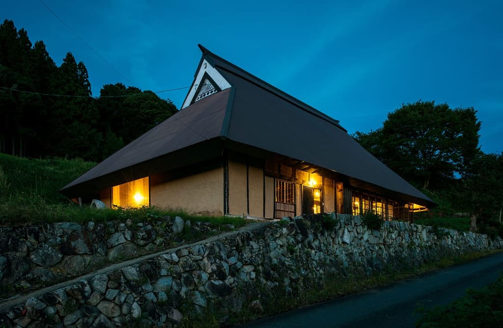 Chojaya is a 250-year-old thatched farmhouse with a traditional timber frame whose screen doors pull back to reveal lush views of the Hibayama mountains