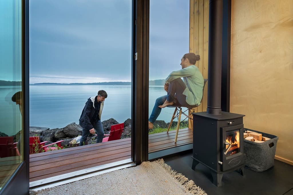 Modern Shed has released a towable prefab cabin, complete with a gable roof and wood-burning stove