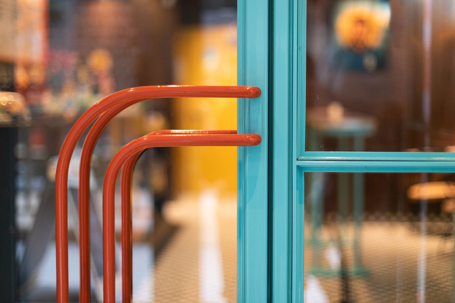 Interiors of Montreal's Caffettiera Caffé Bar are inspired by the 1990s