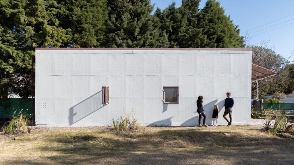 Concrete panels make up the boxy prefab, which arrives turn-key and is ready within 24 hours of delivery