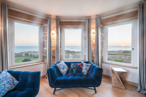 A converted semaphore station and lighthouse perches on the rocky Breton coast