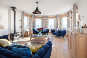 A converted semaphore station and lighthouse perches on the rocky Breton coast