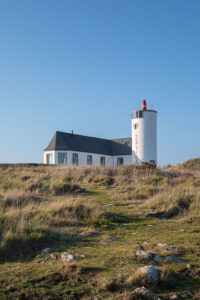 A converted semaphore station and lighthouse perches on the rocky Breton coast