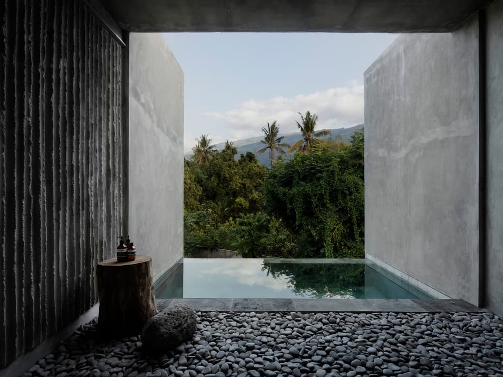 Concrete and bamboo frame jungle views at Bali’s Tiing Tejakula resort