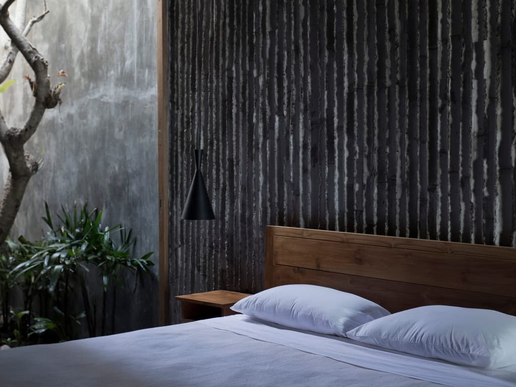 Concrete and bamboo frame jungle views at Bali’s Tiing Tejakula resort