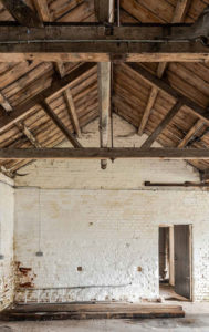 The red brick building sits on the banks of the River Colne and is a vacant shell that’s already been stripped back to its bones