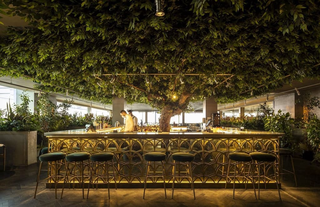 Biophilic Lisbon restaurant Seen invites diners to an art-deco forest