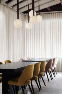 The colours of a desert sunset wash over Montreal restaurant Shay