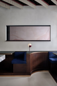 The colours of a desert sunset wash over Montreal restaurant Shay