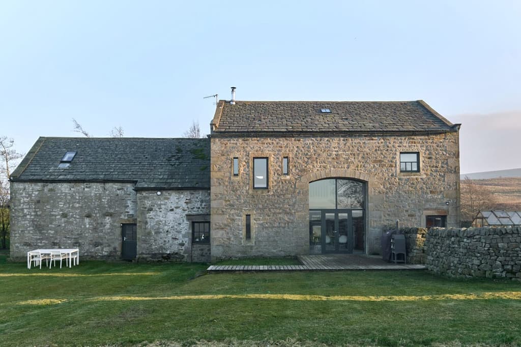 Sitting on the southerly edge of the Yorkshire Dales, on a private three-and-a-half-acre plot, Wildman’s comprises two historic stone barns that have undergone a top-to-toe transformation by their owner.