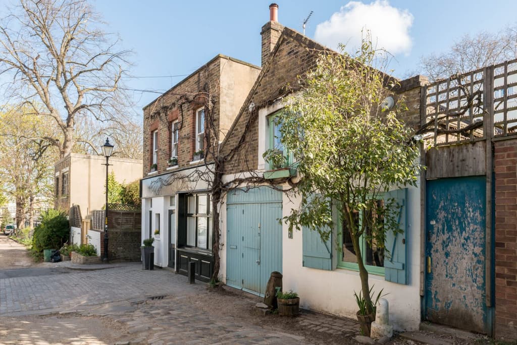 A view of Canning Cross where the stable sits on a cobbled street