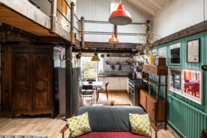 Far from minimalist, the rustic home is rich with textures, colour and eclectic furnishings