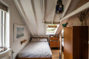 The old haylofts have been converted into two bedrooms, bookending the two-bedroom property.
