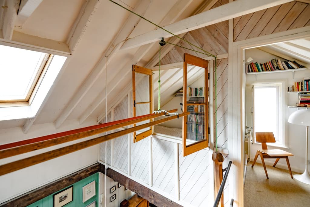 The two-bedroom home has been very lightly converted, changing little of its character despite its change of use