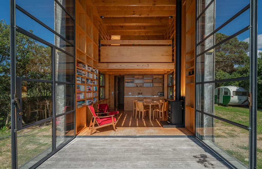 An unorthodox 'hut on sleds' is for sale in New Zealand