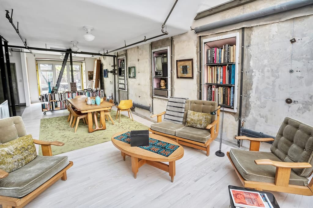 The apartment takes over the Manhattan building's former mechanics room
