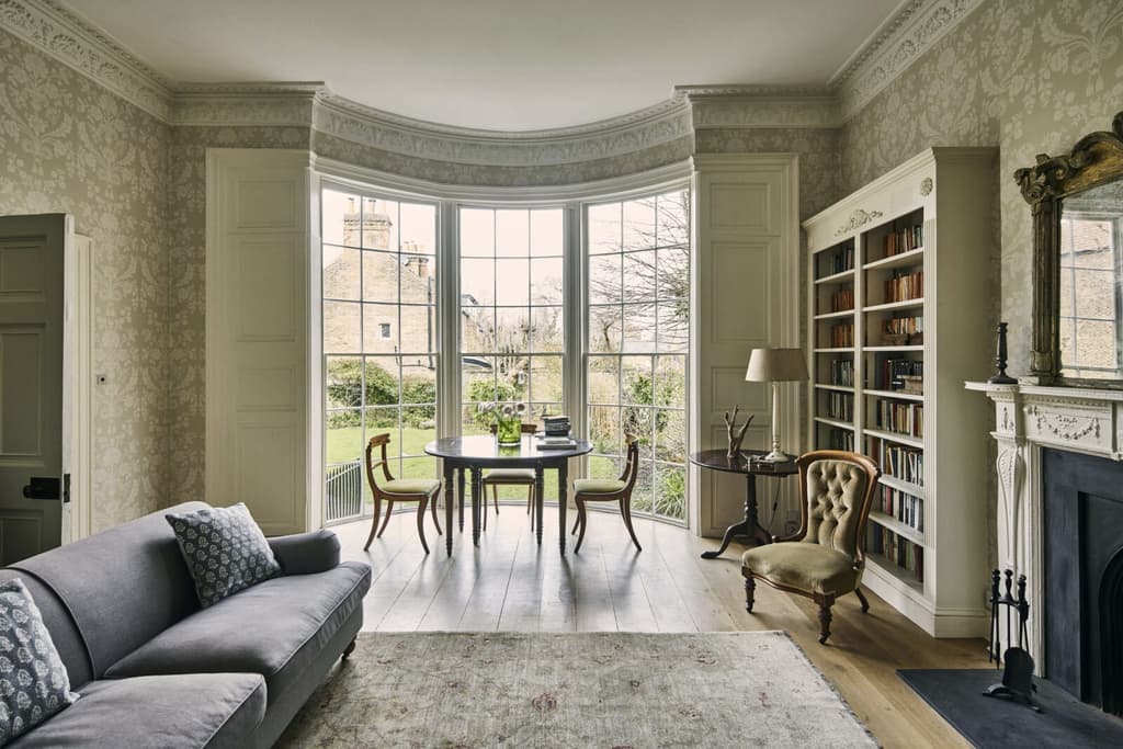 The former ballroom features floor to ceiling curved sash windows